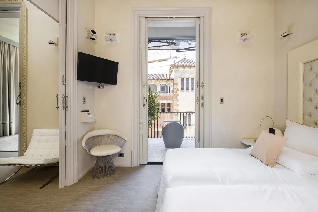 1679314175-Luxury property Barcelona passeig de gracia apartment Grec bedroom.webp